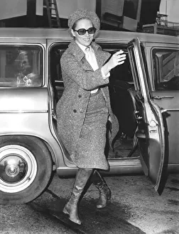 2002 Prints: Faye Dunaway arriving at the London airport to catch a flight to Paris, February 2, 1968