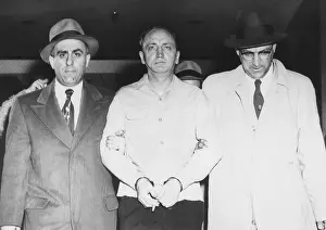 Theft Prints: FBI agents escort James I. Faherty