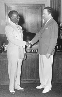 Hoover Prints: FBI Director J. Edgar Hoover shakes hands with actor/dancer Bill Bojangles Robinson