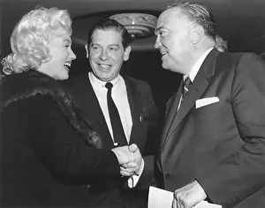 Milton Prints: FBI Director J. Edgar Hoover shaking hands with Marilyn Monroe