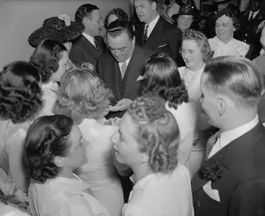 Heroes Prints: FBI Director J. Edgar Hoover surrounded by female admirers, ca. 1940. (BSLOC_2013_8_160)