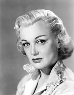 Jsx 64 Prints: FEMALE ON THE BEACH, Jan Sterling, 1955