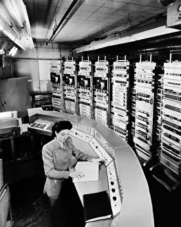 Engineers Prints: Female operator at the console of the Raydac