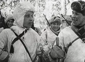 Cold Prints: Finnish Soldiers in white uniforms that camouflage them against the snow