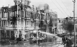 Streets Prints: Fire engine spraying water on burned buildings in San Francisco after the 1906 earthquake (BSLOC_2017_17_12)