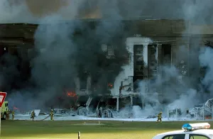 Plane Prints: Firefighters work to put out the flames moments after a hijacked jetliner crashed into the Pentagon at approximately 9