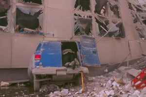Skyscraper Prints: Fireman checking inside the back of a van after 9-11 terrorist attack in New York City