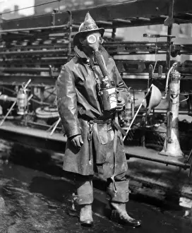Breathing Prints: Fireman in protective gear which includes a gas mask