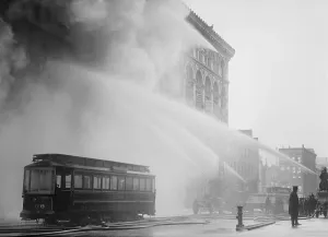 Disaster Prints: Firemen spraying three streams of high pressure water on a fire on 14th St