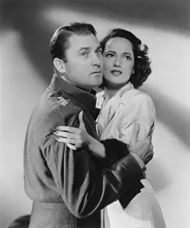 Images Dated 10th July 2015: FIRST COMES COURAGE, from left: Brian Aherne, Merle Oberon, 1943