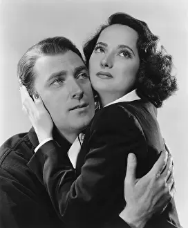 FIRST COMES COURAGE, from left: Brian Aherne, Merle Oberon, 1943