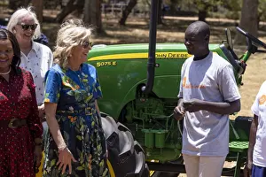 Technology Prints: First Lady Jill Biden speaks with a smallholder farmer who leased farm machinery from participation in Hello Tractor