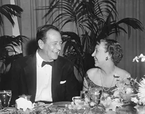 Movie Stars Prints: First Lady Mamie Eisenhower and actor John Wayne at political dinner