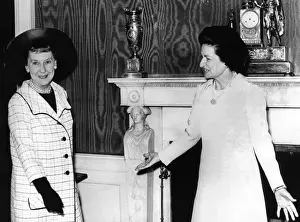 Ladies Prints: Former First Lady Mamie Eisenhower is welcomed by Lady Bird Johnson for the annual luncheon for the Senate ladies