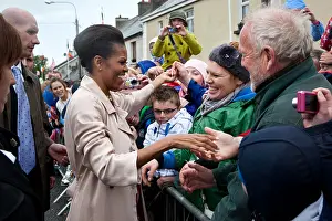 Irish Prints: First Lady Michelle Obama greets local residents on Main Street in Moneygall