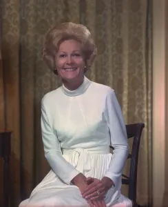 Bouffant Prints: First Lady Patrician Nixon in an elegant high necked white dress. Ca. 1970-74