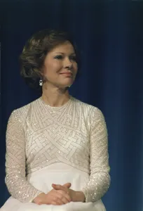 Evening Dress Prints: First Lady Roslyn Carter in a white sequined dress at a Democratic National Committee Fundraiser in Atlanta Georgia