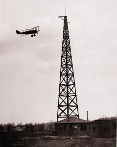 Signals Prints: First radio beacon station, with the operating shack and antenna system at College Park