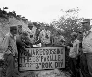 Un Offensive Prints: First UN troops to cross the 38th Parallel hold a sign posting ceremony