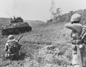 Okinawa Prints: Flame throwing Marine tank and riflemen moving up to the front line action on southern Okinawa