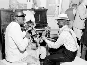 Halloween Prints: Folk Music. Itinerant laborers in blackface provide music for dancing at Shafter camp for migrants