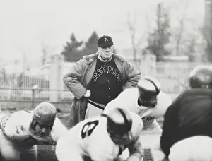 Earl Prints: Football coach Earl Red Blaik, oversees his players as they practice