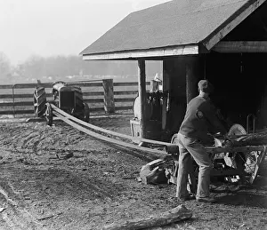 Labor Prints: Ford model tractor powering a belt drive saw mill