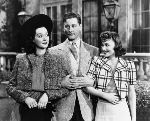 Jealousy Prints: FOUR'S A CROWD, from left, Rosalind Russell, Errol Flynn, Olivia de Havilland, 1938
