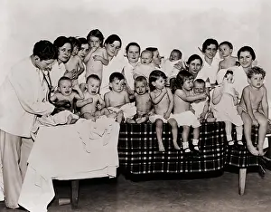 Physicians Prints: Fourteen infants waiting to be examined by Dr