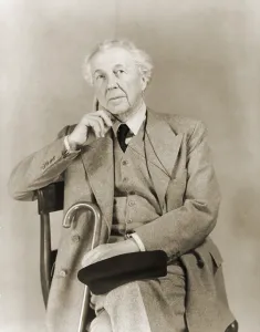 Frank Lloyd Prints: Frank Lloyd Wright (1867-1959), American architect in 1938 portrait