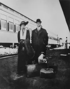 Lcgr1305 Prints: Franklin and Eleanor Roosevelt at a train station with luggage. 1910. (BSLOC_2013_6_26)
