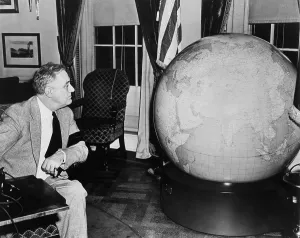 2013 Prints: Franklin Roosevelt examines a globe presented to him by the U