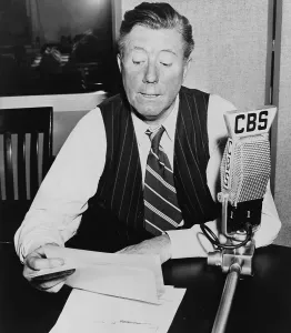 2008 Prints: Frazier Hunt, (1885- ) early newscaster, seated at desk behind CBS microphone. 1941