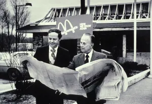 Retail Prints: Fred Turner and Ray Kroc the executive leaders of McDonald's Corporation looking at blueprints of future restaurant