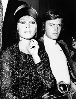Brigitte Prints: French actress Brigitte Bardot escorted by her 23 year old boyfriend Patrick Gilles