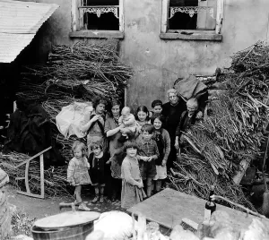 Explosives Prints: French family outside their home in Saint Lo