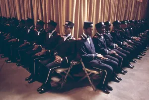 Black Power Prints: The Fruit of Islam body guards for Elijah Muhammad sit in formation while the leader delivers his annual Saviors Day