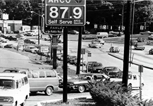 Lined Up Prints: GAS SHORTAGE-Cars wait in a long line at a gas station during the gas shortage