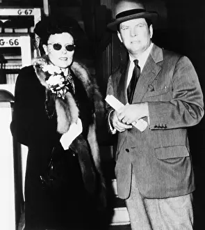 Socialite Prints: Gene Tunney, and Mrs. Tunney at Churchill Downs for the running of the Kentucky Derby