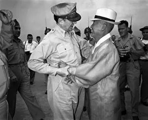 Inauguration Prints: General Army Douglas MacArthur is welcomed by Dr. Syngman Rhee at Kimpo Air Force Base