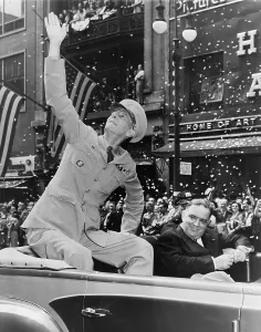 Jonathan Prints: General Jonathan Wainwright, waving to crowd during ticker tape parade