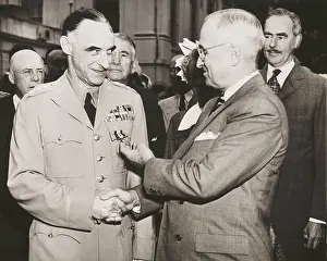 Honors Prints: General Lucius Clay after receiving the Oak Leaf Cluster medal from President Harry Truman
