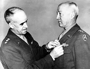 General Prints: General Omar N. Bradley pins Bronze Cluster on the lapel of Lt