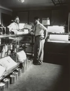 Commerce Prints: General store shopkeeper and customer