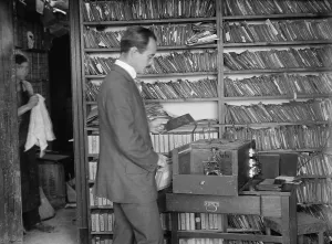 News Prints: George Bain printing news photographs for his media subscribers in New York City