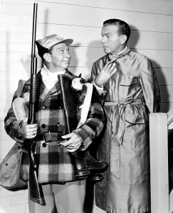 THE GEORGE BURNS AND GRACIE ALLEN SHOW, from left, Harry Von Zell, George Burns, To Go or Not to Go, aired January 18, 1951