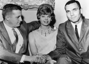 Handshake Prints: George Steinbrenner (left), shakes hands with Jerry Lucas (right)