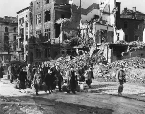 Lcgr1406 Prints: German civilians carry belongings as they follow an American soldier out of Aachen