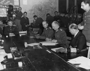 Admirals Prints: German General Gustaf Jodl, signs the unconditional surrender document