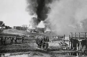 Lcgr1406 Prints: German infantry advancing on a burning village in the Soviet Union (Russia)